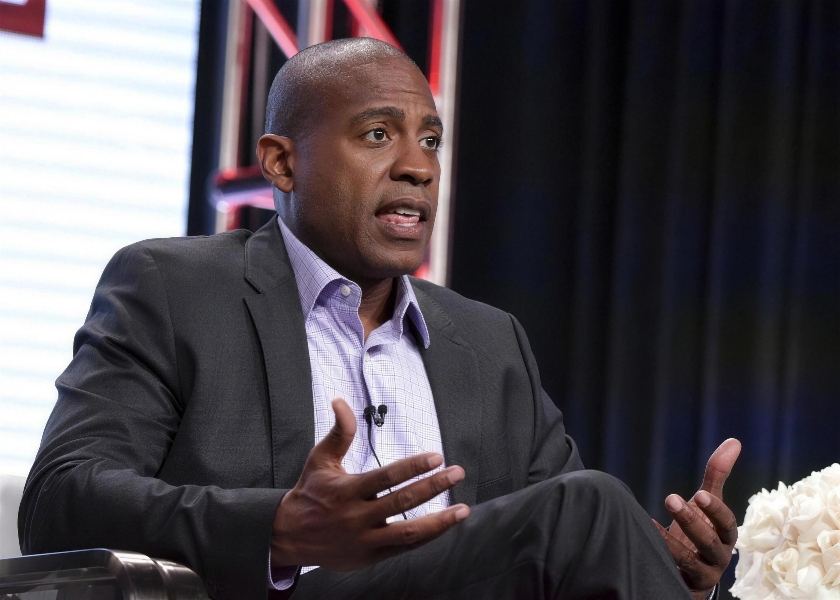 Carlos Watson speaking on a panel